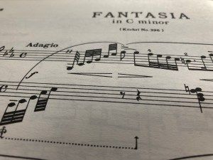 The title and opening bar of Mozart’s Fantasia in C minor