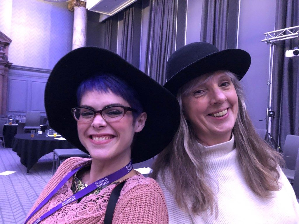 Sara Jane Harvey and Catriona Stewart, sporting wide-brimmed black hats