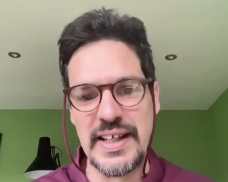 Will Mandy talking on Zoom from his home.