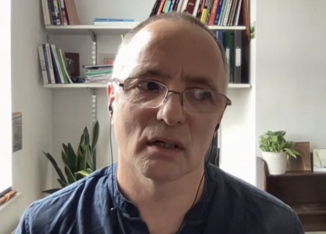 Jonny Drury on Zoom in his home, leading us in a brief mindfulness meditation.