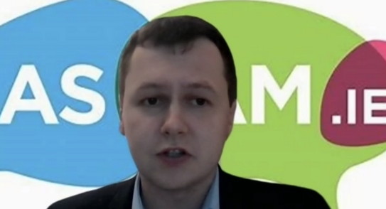 Adam Harris talking on Zoom, with a background of the AsIAm.ie logo.