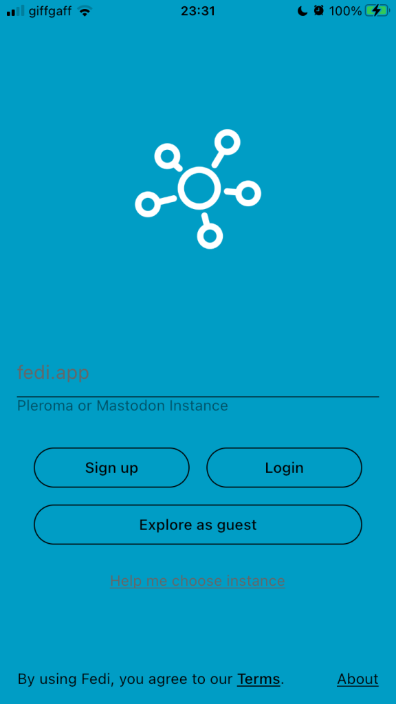 Fairly empty blue screen, dominated by the poor logo in the top half, with a line to type in the name of a Mastodon instance (fedi.app given as an example) beneath that. There are three buttons, ‘Sign up’, ‘Login’ and ‘Explore as guest’. Beneath those, in small text: ‘Help me choose an instance’ (hyperlinked). At the bottom of the screen: ‘By using Fedi, you agree to our terms’ (‘terms’ hyperlinked), and ‘About’ (hyperlinked).