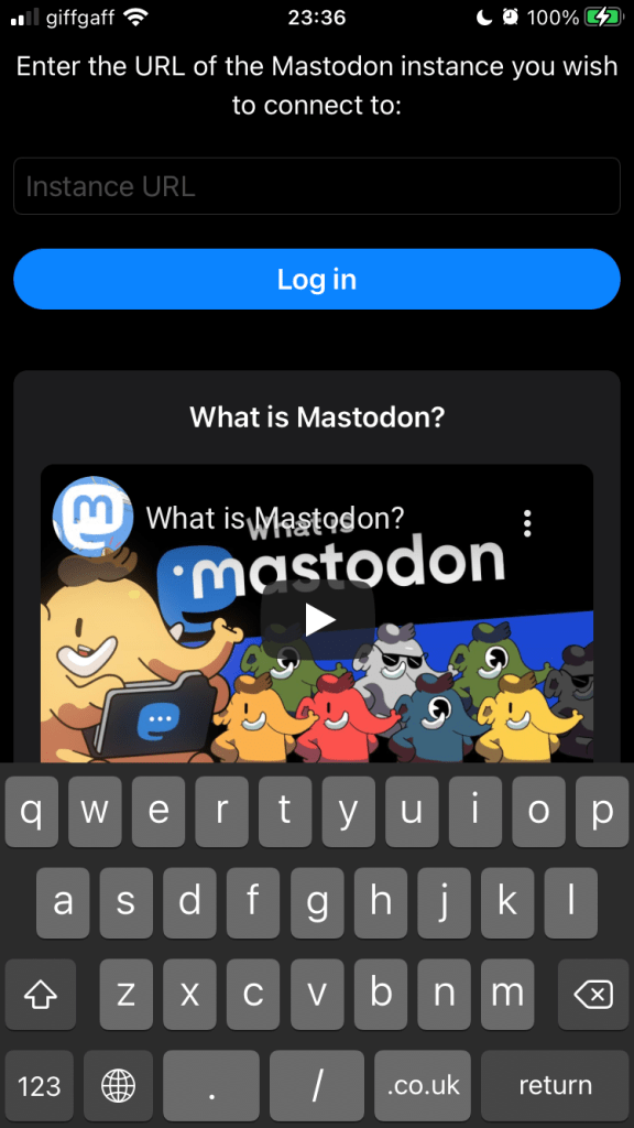 At the top of the screen with a black background is a box labelled, ‘Enter the URL of the Mastodon instance you wish to connect to’. Beneath that is a ‘Log in’ button. Under that is a playable video, ‘What is Mastodon?’, featuring more cartoon elephants.