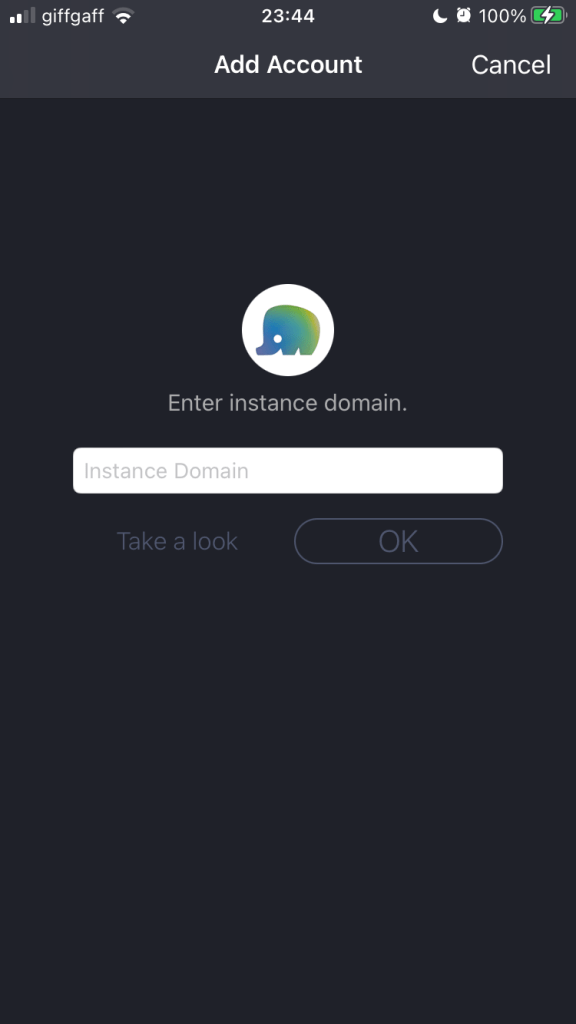 Screen titled ‘Add Account’. Beneath a small elephant logo is a text field in which to ‘Enter instance domain’. Below that are a ‘Take a look’ link and an ‘OK’ button.