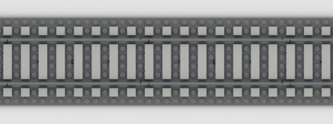 A straight stretch of grey LEGO track, with matching plates used as ballast. Light grey tiles are used to give the impression of sleepers that are just one stud wide, with an equal space between them.