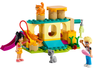 A small LEGO set with a cat playground containing scratching posts, fish toys, tunnels and a slide. There are two cats, one grey, one ginger. And two LEGO mini-dolls are playing with them.